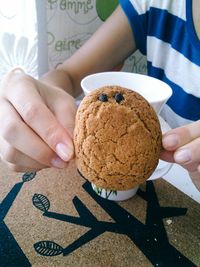 Cropped image of woman holding hands