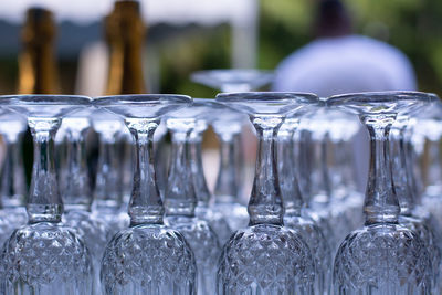 Close-up of water drops on glass bottles