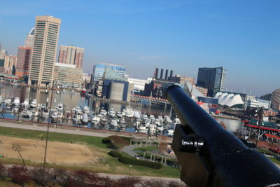 Close-up of modern cityscape against clear sky