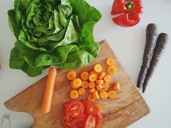 High angle view of chopped vegetables on cutting board