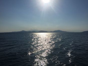 Scenic view of sea against clear sky during sunset