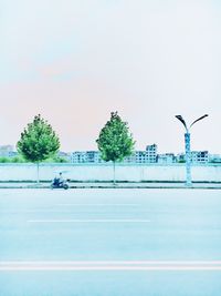 View of street light against blue sky