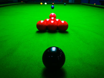 Close-up of red ball on table