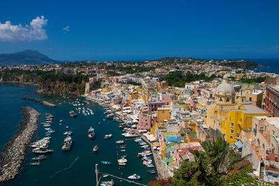 High angle view of townscape against blue sky