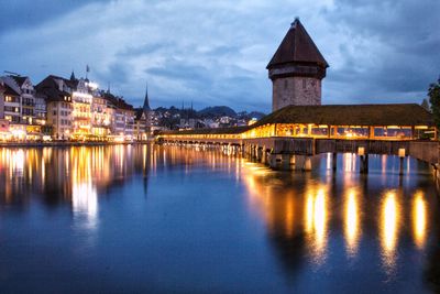 Illuminated buildings in water