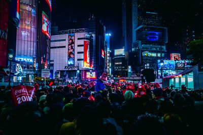 Group of people in city at night