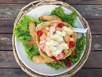 High angle view of salad in bowl on table