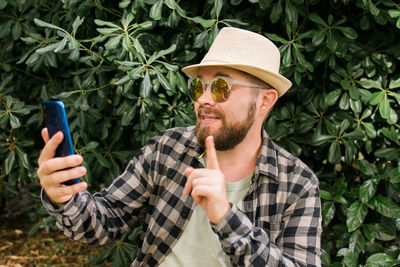 Young man using mobile phone