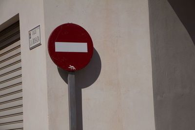 Close-up of sign on wall
