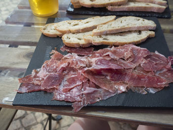Close-up of meat on cutting board