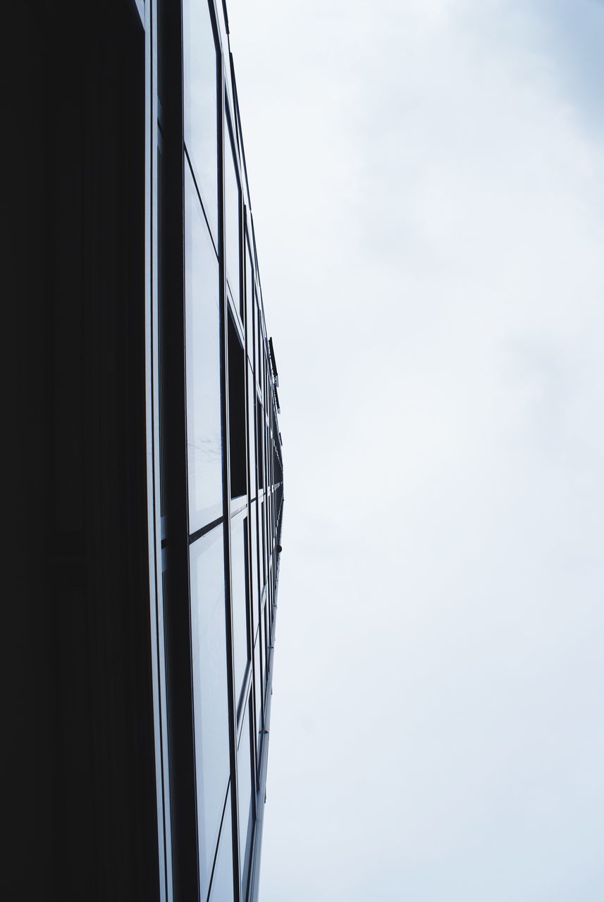 low angle view, sky, built structure, clear sky, architecture, day, outdoors, metal, no people, pattern, directly below, part of, copy space, connection, metallic, cropped, structure, design, building exterior, cable