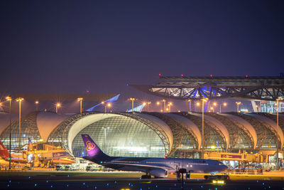 View of bridge in city at night