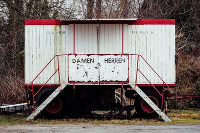 Rusty sign on abandoned bus