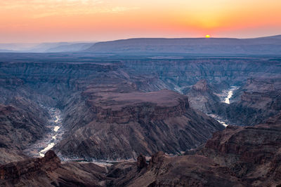 Scenic view of landscape during sunset