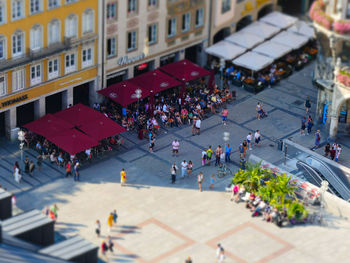 High angle view of people on street in city