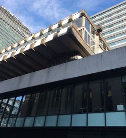 Low angle view of modern building against sky