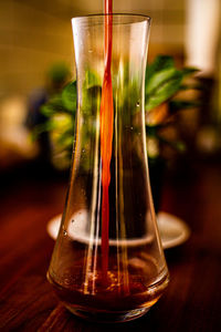 Close-up of beer glass on table