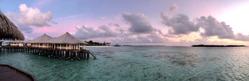 Panoramic view of sea against sky during sunset