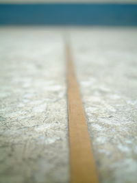 Close-up of wood on beach