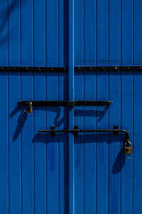 Full frame shot of closed blue wooden door