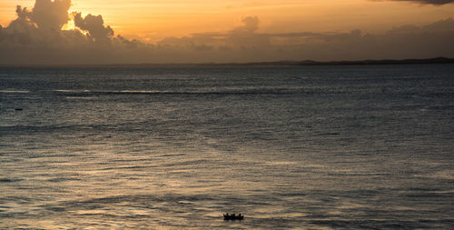 Scenic view of sea at sunset