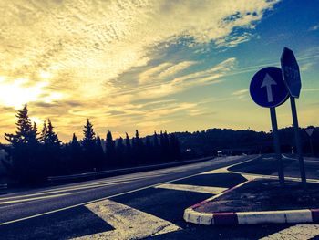 Empty road at sunset