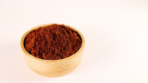 Close-up of cake against white background