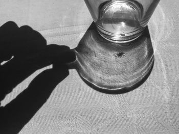 High angle view of drinking glass on table