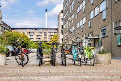 Bicycle concept in copenhagen, denmark. bikes parked on the side of the street.