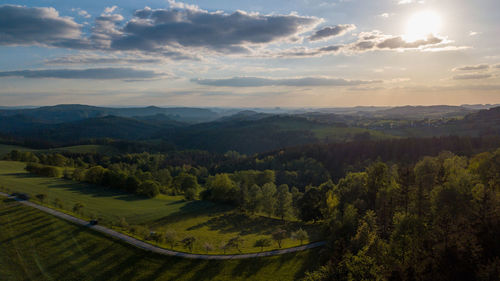 Scenic view of landscape against sky during sunset