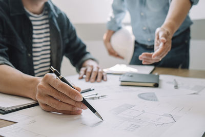 Group of people working on table