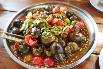 High angle view of salad in bowl on table