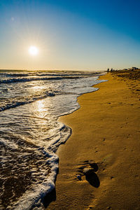 Scenic view of sea against sky during sunset