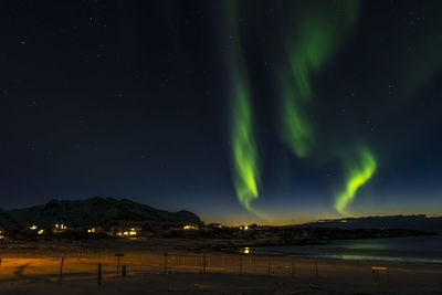 Scenic view of sea against sky at night