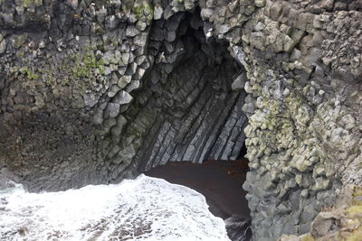 High angle view of rocks on shore during winter