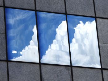 Low angle view of built structure against blue sky