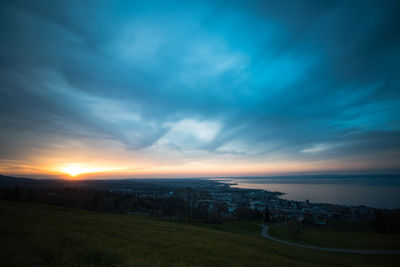 Scenic view of landscape against sky during sunset