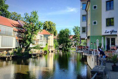 View of canal along buildings