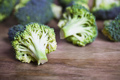 Close-up of broccoli on wooden table