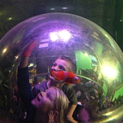 View of illuminated people at night