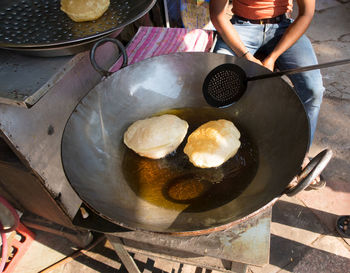 High angle view of man preparing food