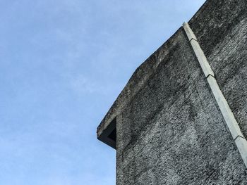 Low angle view of building against blue sky