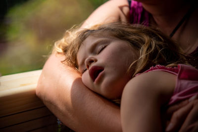 Portrait of young girl sleeping 