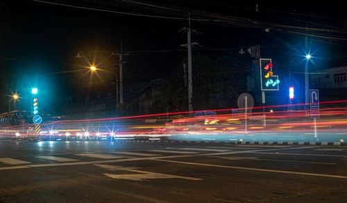 Light trails on city street at night