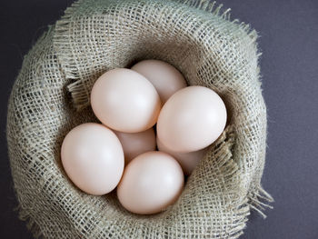 High angle view of eggs in basket