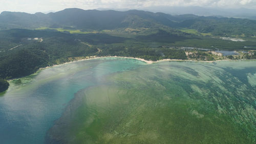 High angle view of sea and mountains