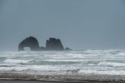 Scenic view of sea against clear sky