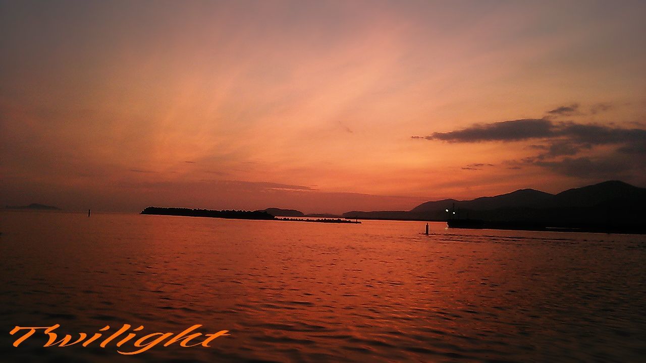 sunset, water, sea, nautical vessel, scenics, boat, sky, orange color, tranquil scene, tranquility, beauty in nature, mode of transport, nature, idyllic, rippled, cloud - sky, outdoors, cloud, mountain, calm, no people, sailboat, ocean, dramatic sky, non-urban scene, remote