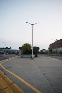 Empty road against clear sky