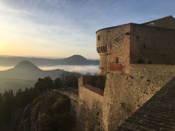 View of fort against sky during sunset san leo 